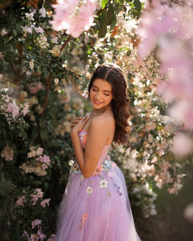 Close portrait of a quinceañera with her bouquet